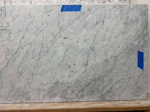 Natural marbe, carrara like, very beautiful piece light-colored base with soft, natural veining, creating an elegant and versatile design. It is perfect for small vanity tops, shower seats, window sills, door sills, or similar applications.