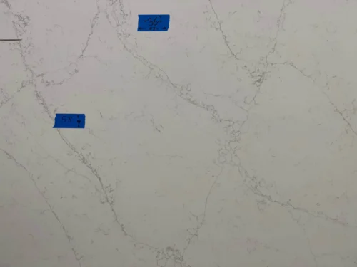 IMG_9068-scaled This quartz slab has a soft white base with subtle, fine gray veining for a clean and timeless aesthetic. Its elegant design makes it perfect for small vanity tops, shower seats, window sills, door sills, or similar applications.